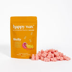 Gold pouch of happy wax Sicily scented soy wax melts with pink wax chunks displayed beside it.
