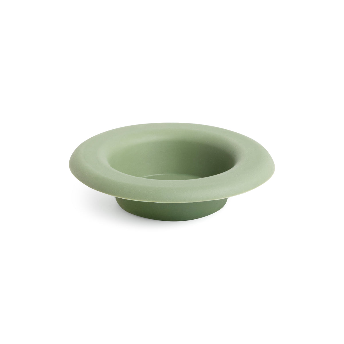 Sage green silicone wax melt dish with wide rim and recessed center bowl.