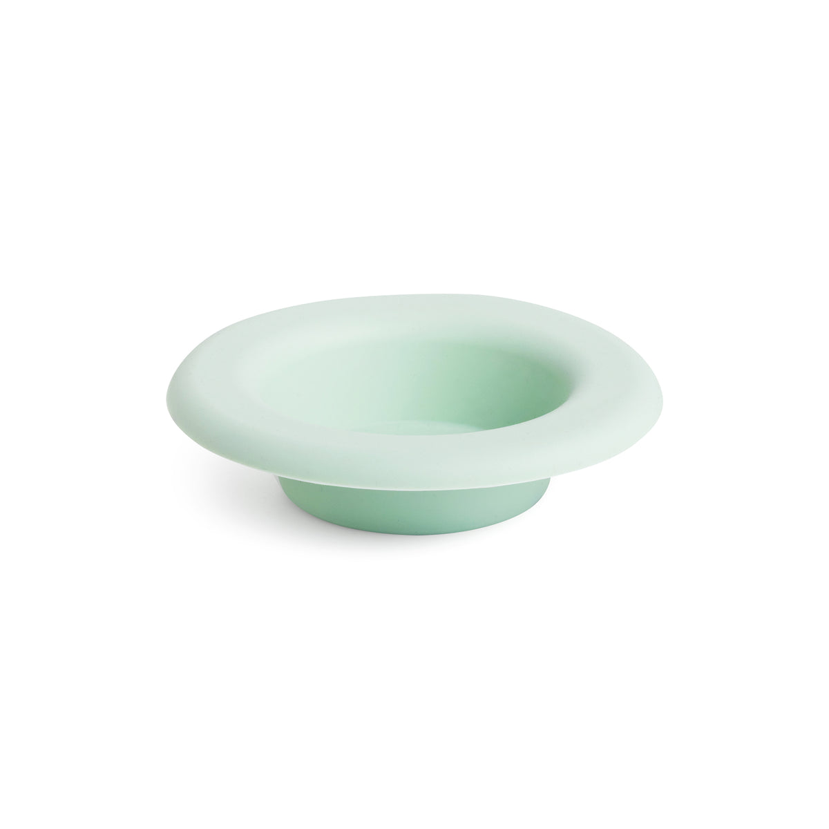 Light green silicone dish on a white background