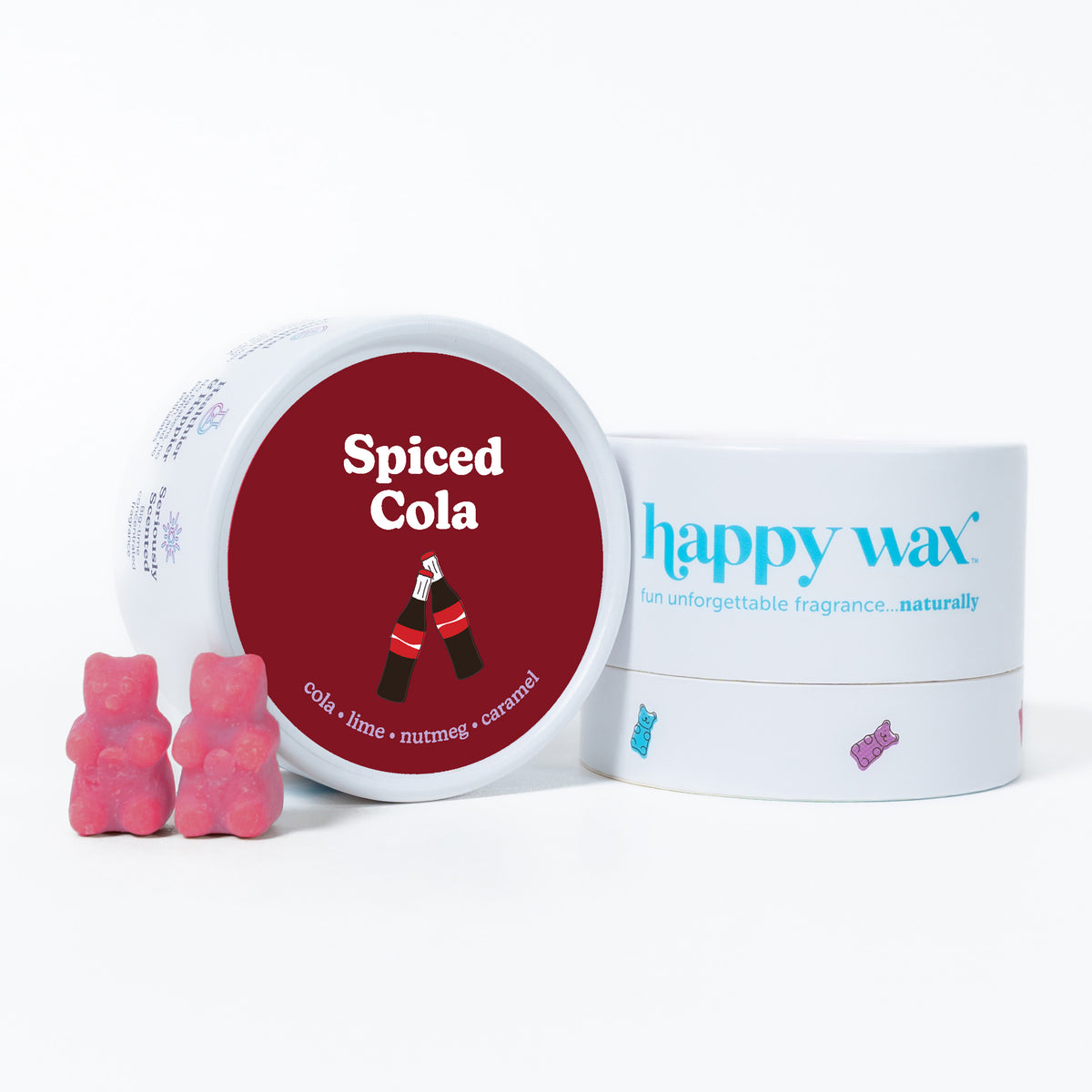 Red and white container of Happy Wax Spiced Cola wax melts with two pink gummy bear-shaped melts displayed in front.