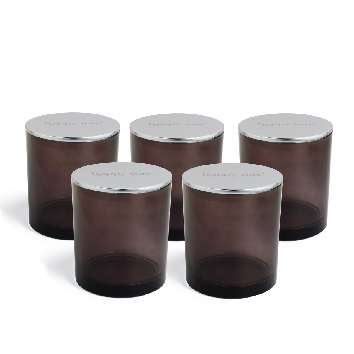 Five brown glass jars with silver lids arranged in a staggered display.