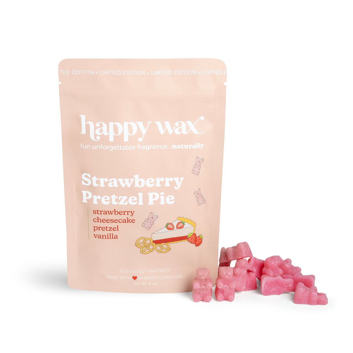 Pink wax melts next to a peach-colored pouch labeled "Strawberry Pretzel Pie" by Happy Wax.