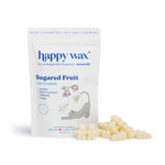 White pouch of Happy Wax Sugared Fruit pet wax melts with cream-colored wax pieces displayed beside it.