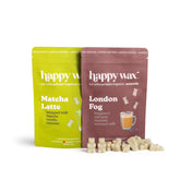 Two scented wax melt pouches in lime green and burgundy with Matcha Latte and London Fog varieties, surrounded by cream-color