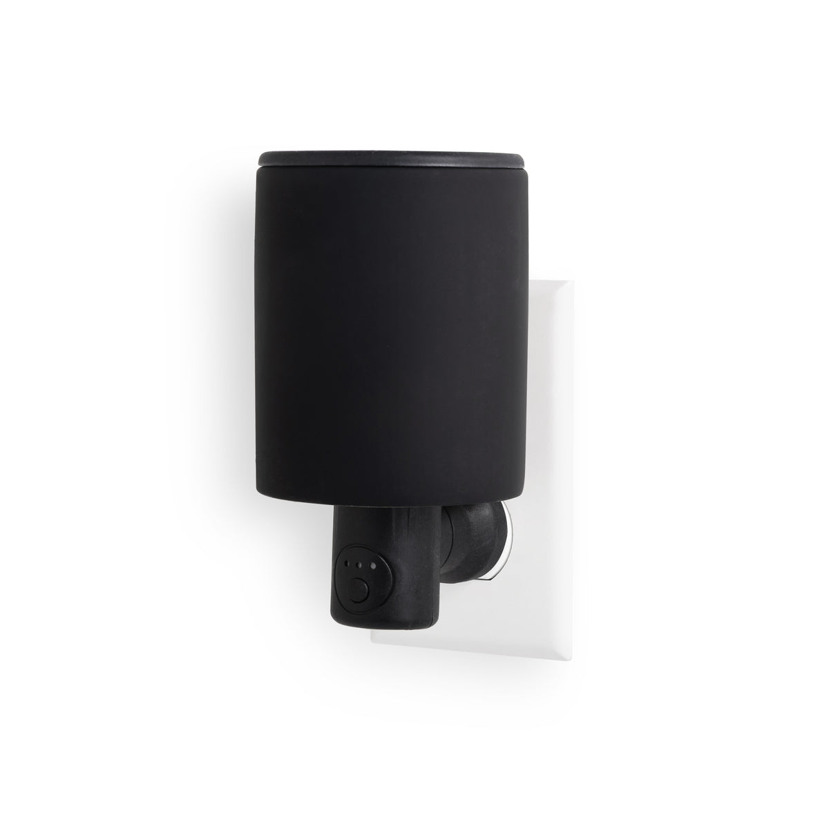 Black cylindrical wax warmer with timer outlet plug and control dial mounted on wall outlet.