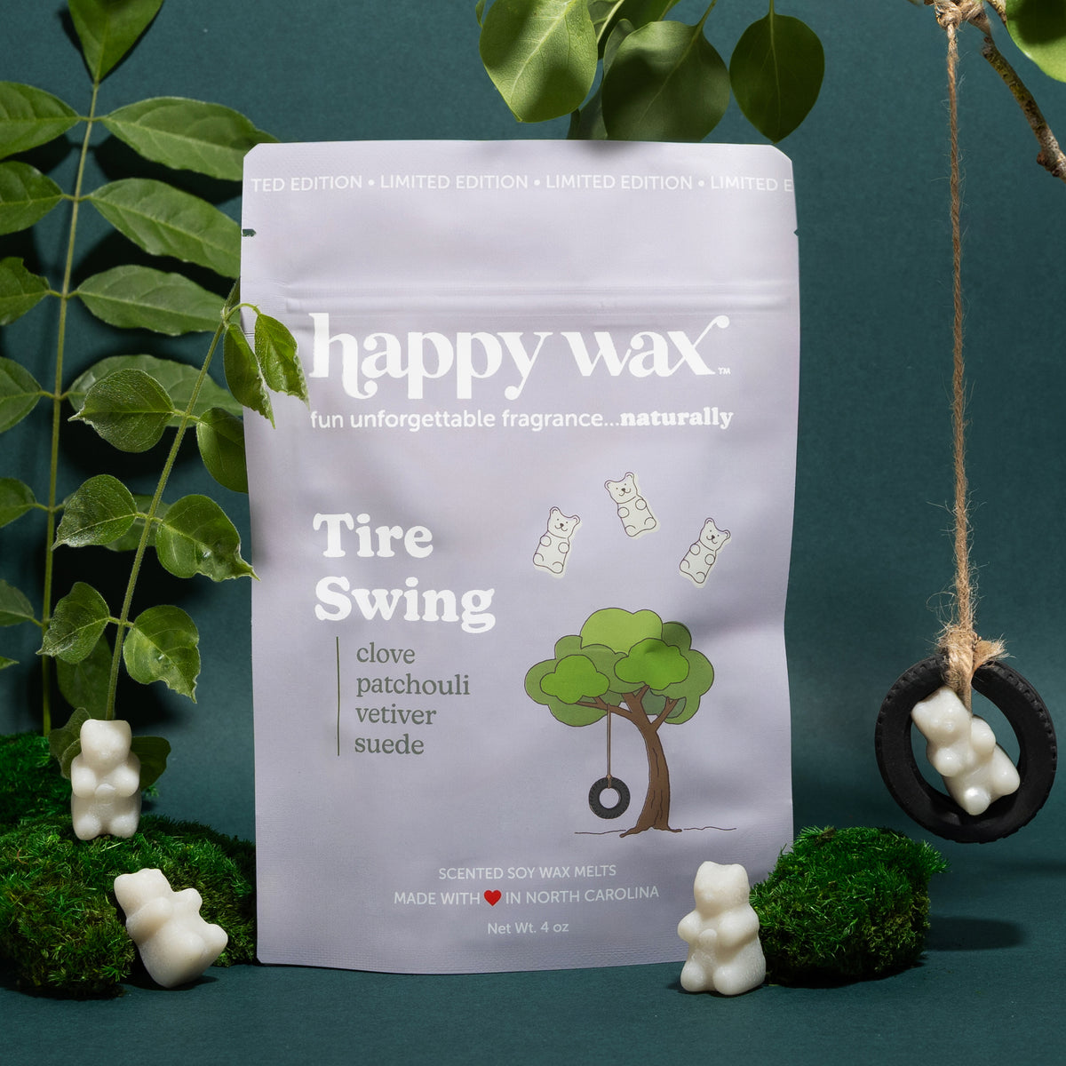 Tire swing wax melt pouch on green background with leaves and bear swinging on tire