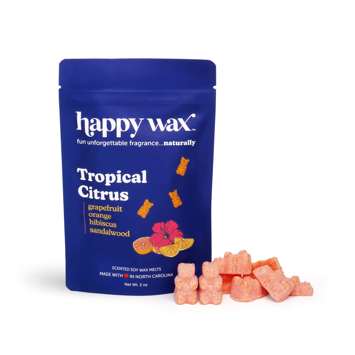 Blue pouch of Happy Wax Tropical Citrus scented soy wax melts with peach-colored wax pieces displayed beside it.