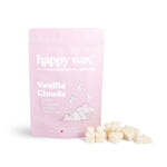 Pink pouch labeled "happy wax Vanilla Clouds" with cream-colored wax melts displayed beside it.