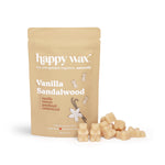 Tan kraft pouch of Vanilla Sandalwood wax melts with cream-colored wax chunks displayed in front.