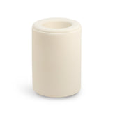 Cream-colored cylindrical wax warmer with removable top and central heating bowl.