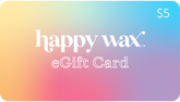 Happy Wax eGift Card with $5 denomination on gradient background transitioning from yellow to blue to pink.
